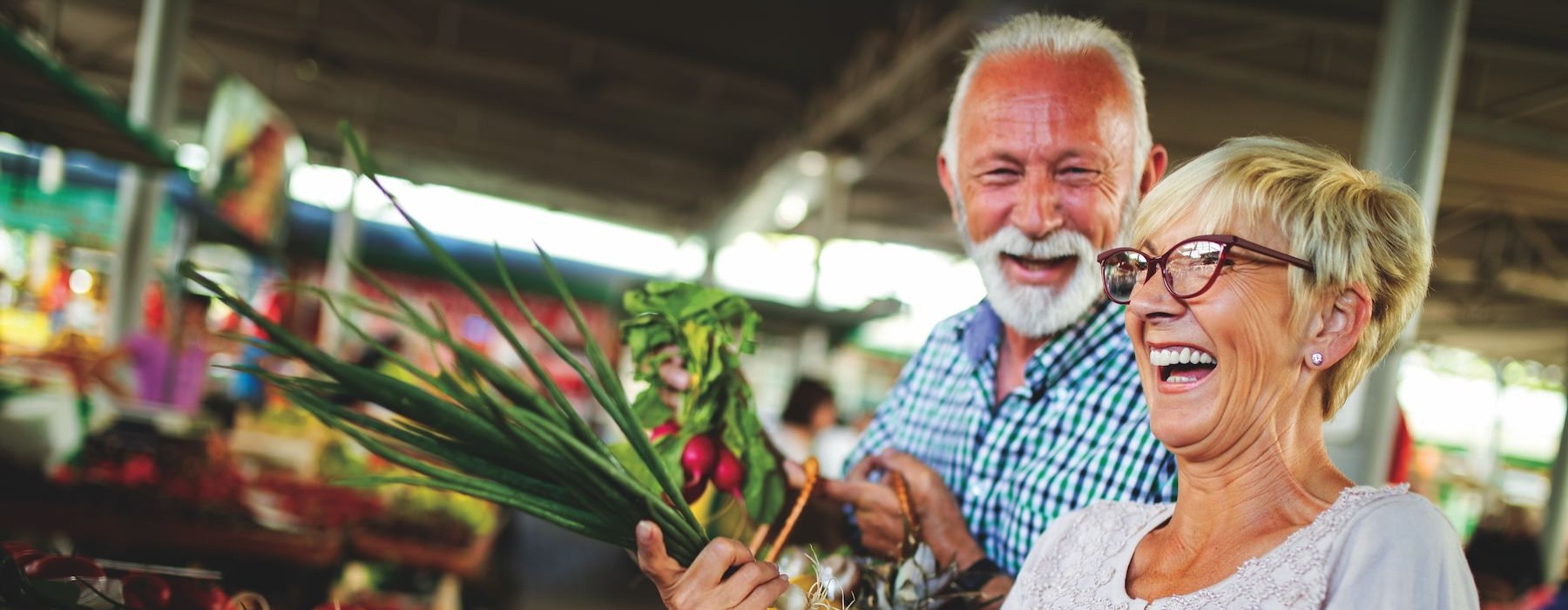 a couple at a farmers market